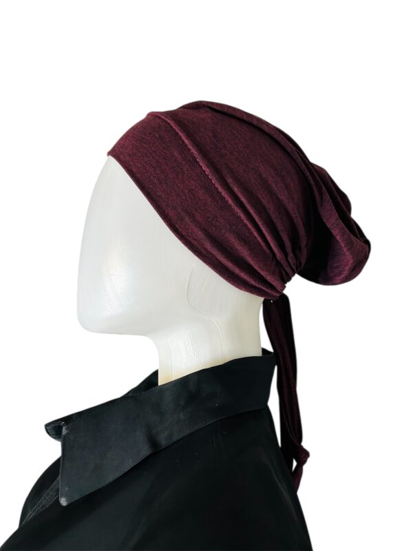 Tie back inner cap